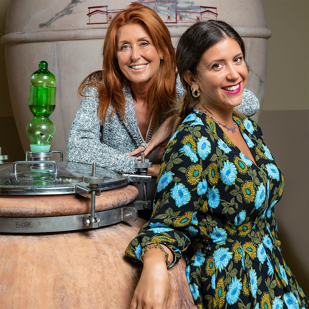 Elisabetta Geppetti and her daughter Clara Gentili with a clay fermenting vessel